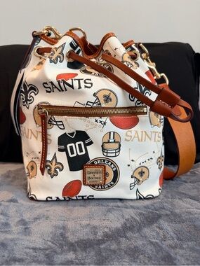 Dooney & Bourke White, Tan and Black New Orleans Saints Drawstring Bucket Bag